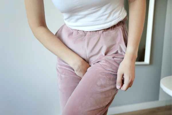 woman running for the toilet because of urinary incontinence Dartford